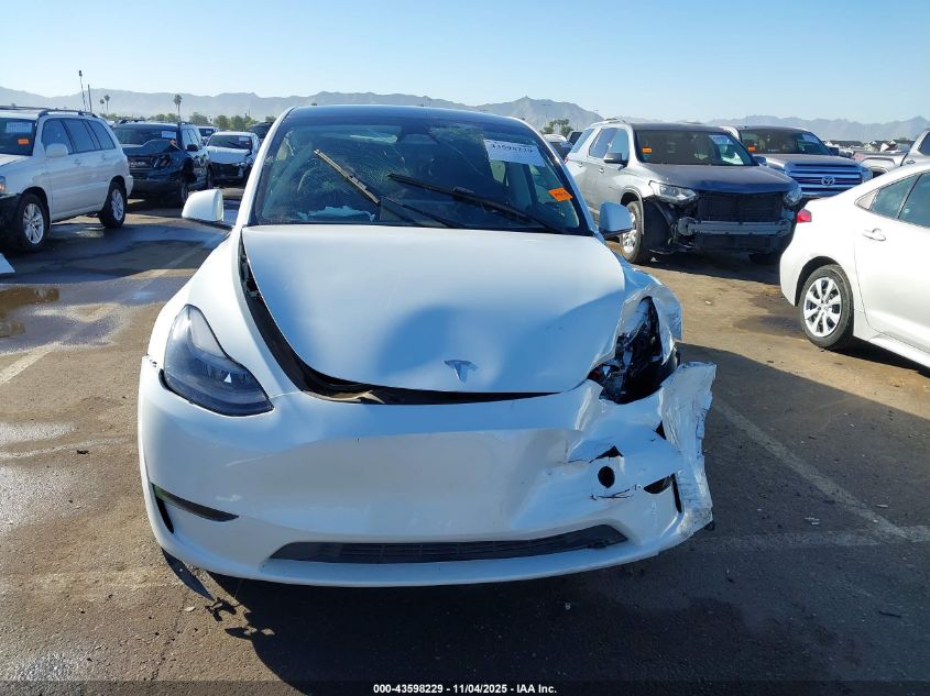 2023 Tesla Model Y Awd/Long Range Dual Motor All-Wheel Drive VIN: 7SAYGDEE1PF814375 Lot: 43598229