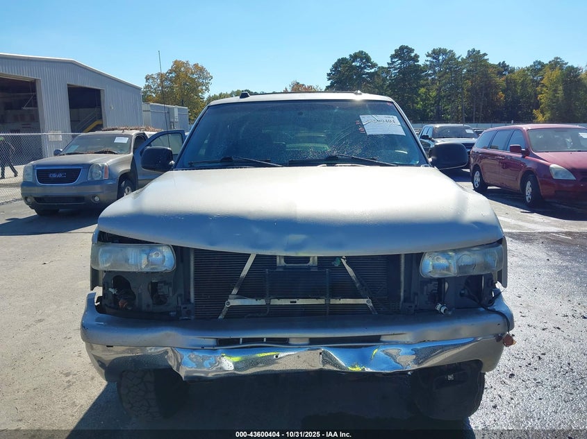 2004 Chevrolet Tahoe Lt VIN: 1GNEC13ZX4J239009 Lot: 43600404