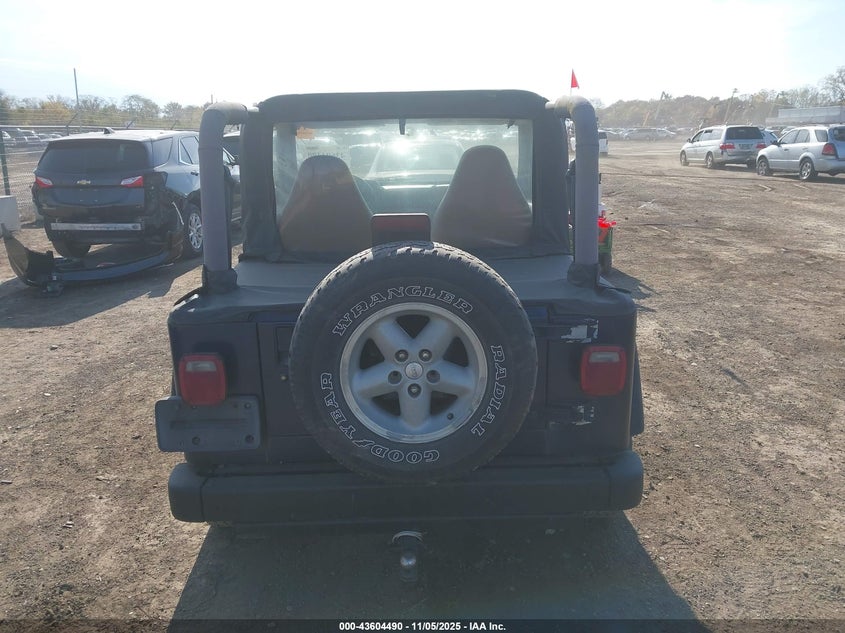 2000 Jeep Wrangler Se VIN: 1J4FA29P9YP735124 Lot: 43604490