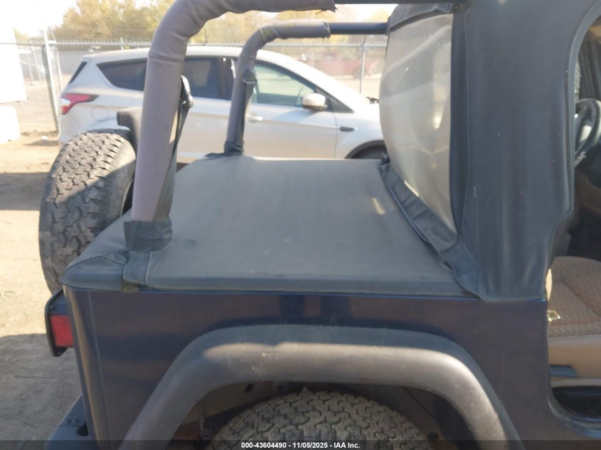 2000 Jeep Wrangler Se VIN: 1J4FA29P9YP735124 Lot: 43604490