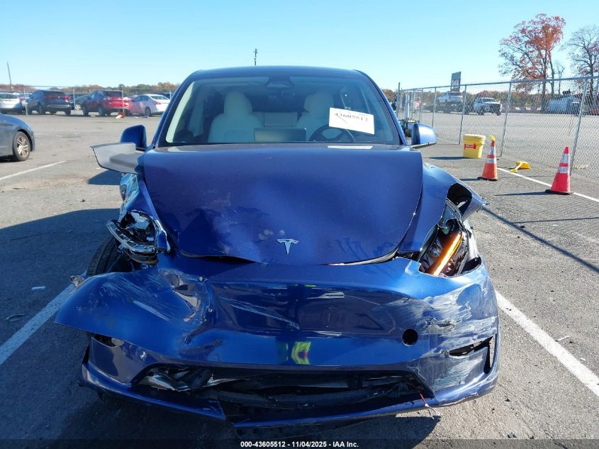 2023 Tesla Model Y Awd/Long Range Dual Motor All-Wheel Drive VIN: 7SAYGAEE9PF842407 Lot: 43605512