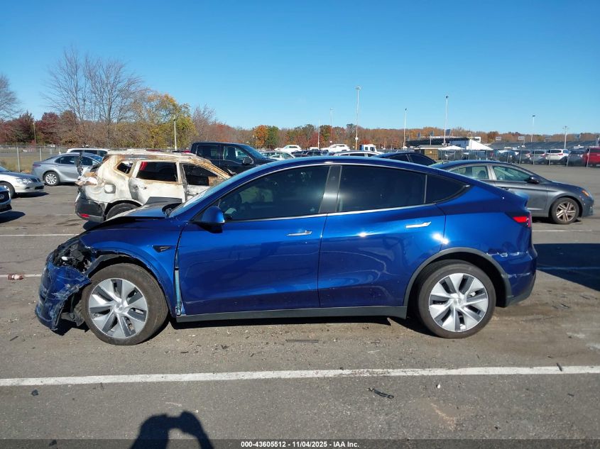 2023 Tesla Model Y Awd/Long Range Dual Motor All-Wheel Drive VIN: 7SAYGAEE9PF842407 Lot: 43605512