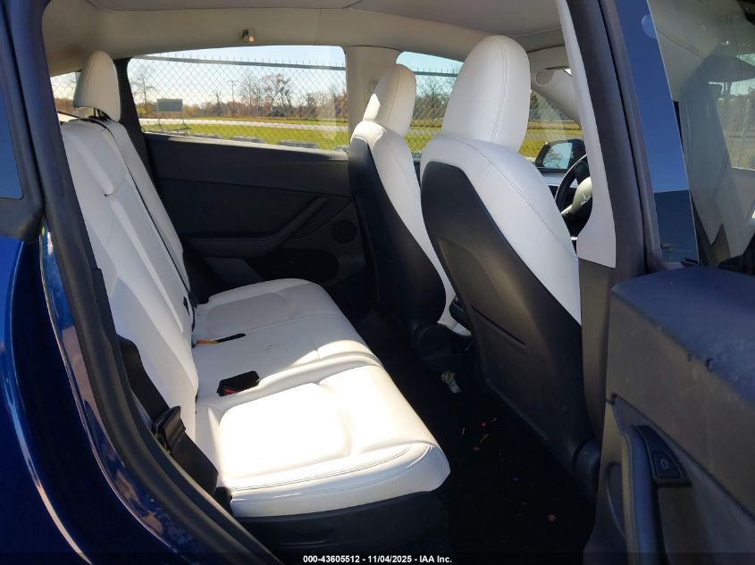 2023 Tesla Model Y Awd/Long Range Dual Motor All-Wheel Drive VIN: 7SAYGAEE9PF842407 Lot: 43605512