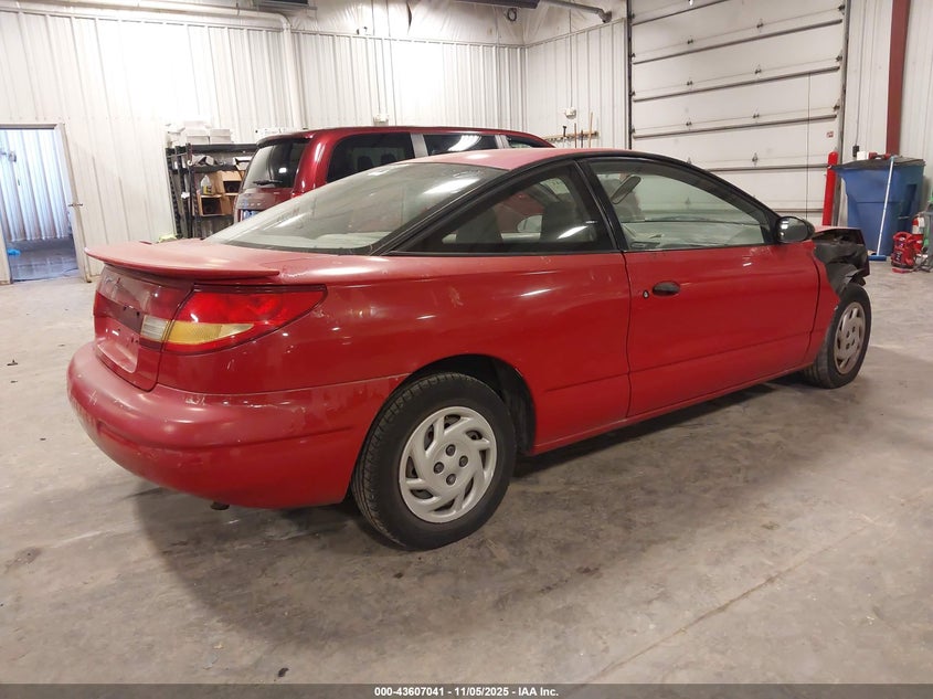 1G8ZP1281XZ317667 1999 SATURN SC photo no. 4