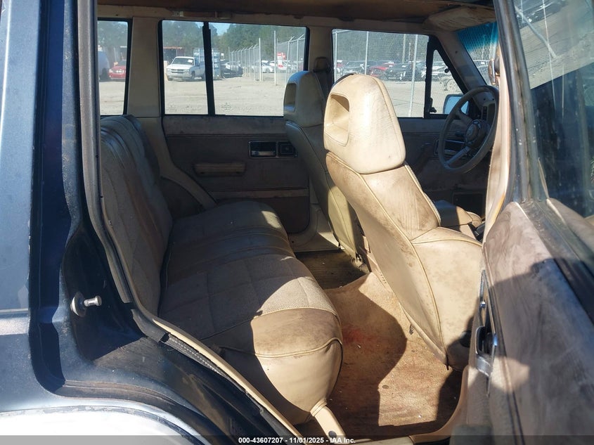 1990 Jeep Cherokee Laredo VIN: 1J4FJ58L9LL153251 Lot: 43607207