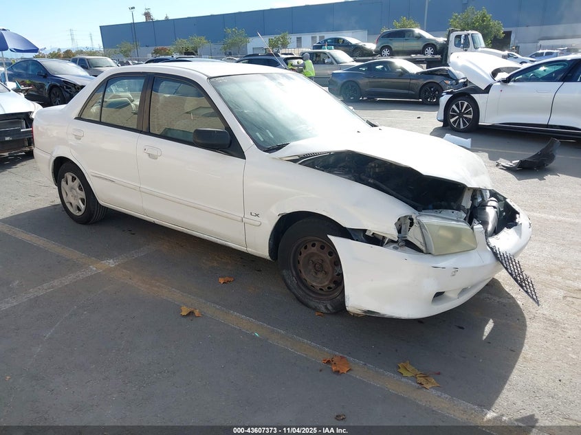 2000 Mazda Protege Dx/Lx white sedan gasoline JM1BJ2228Y0212429 photo #1