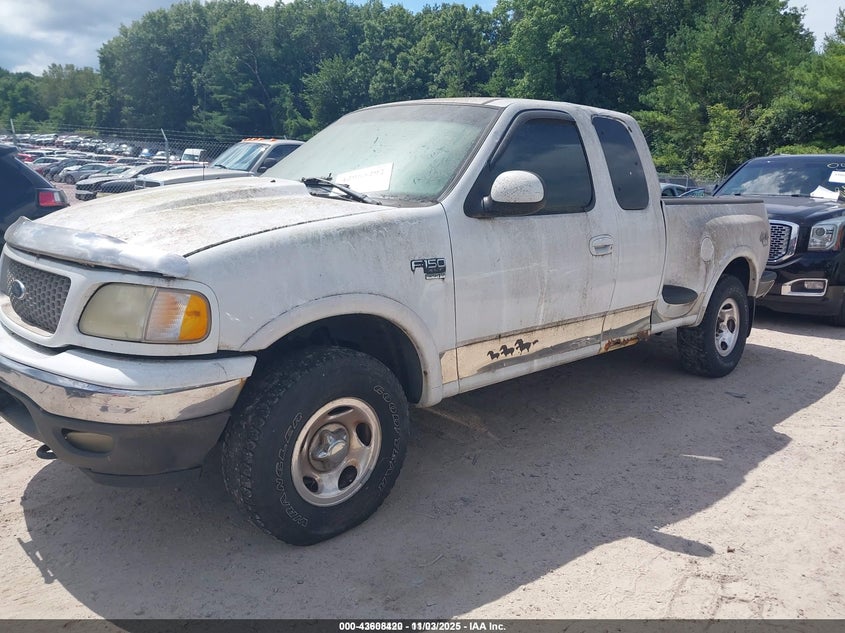 2FTRX08LX2CA82381 2002 FORD F-150 photo no. 2