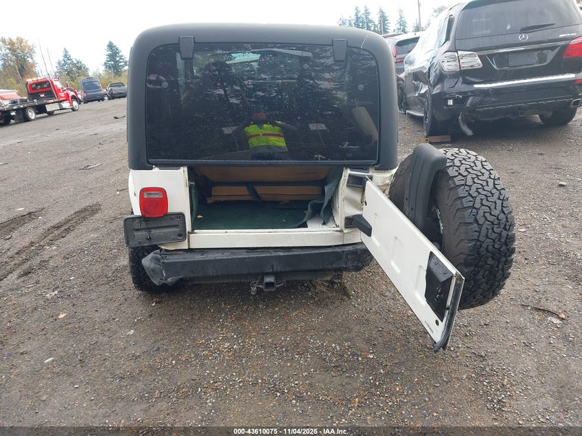 1997 Jeep Wrangler Sahara VIN: 1J4FY49S1VP527519 Lot: 43610075