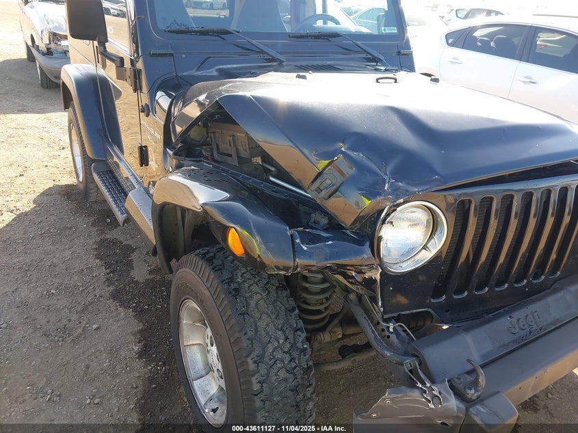 2000 Jeep Wrangler Sahara VIN: 1J4FA59S5YP700778 Lot: 43611127