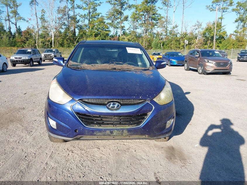 KM8JU3AC5BU197581 2011 HYUNDAI TUCSON photo no. 6