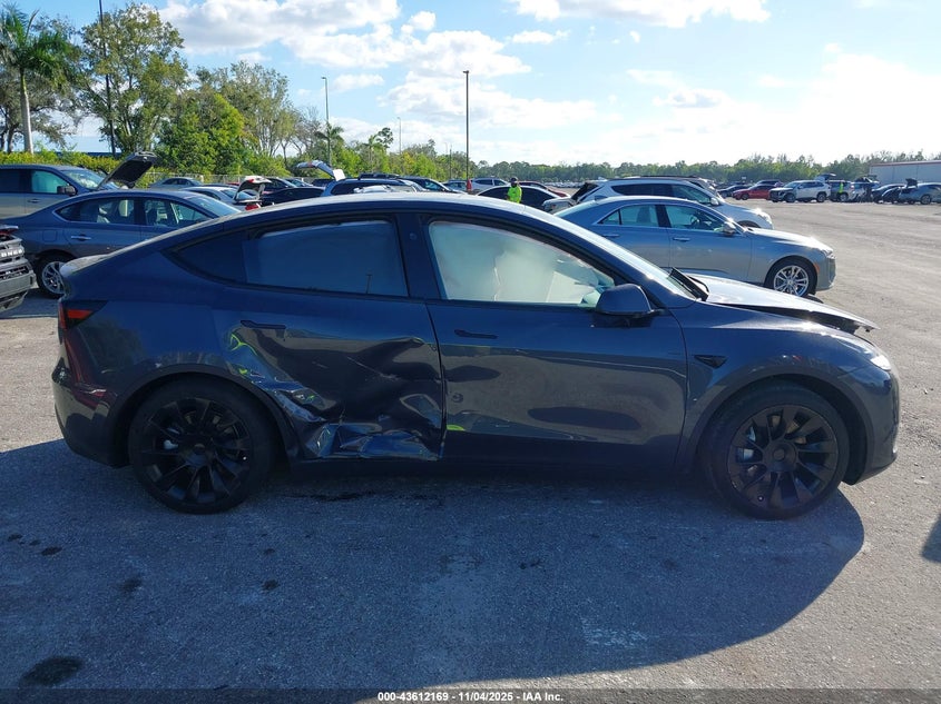 2023 Tesla Model Y Awd/Long Range Dual Motor All-Wheel Drive VIN: 7SAYGDEE6PF840065 Lot: 43612169