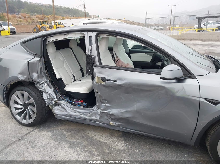 2026 Tesla Model Y Long Range Dual Motor All-Wheel Drive/Long Range Launch Series VIN: 7SAYGDEE1TF342348 Lot: 43617825