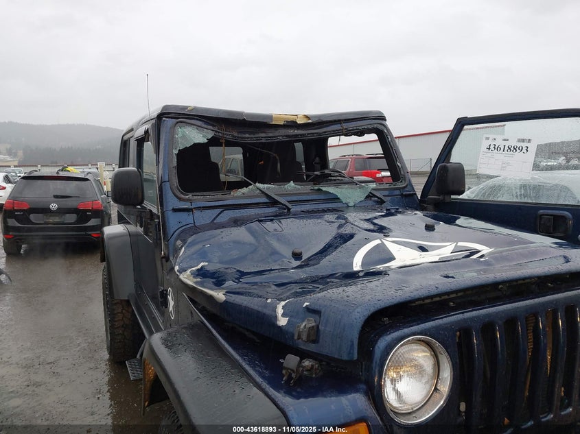 2005 Jeep Wrangler Unlimited VIN: 1J4FA44S45P300241 Lot: 43618893