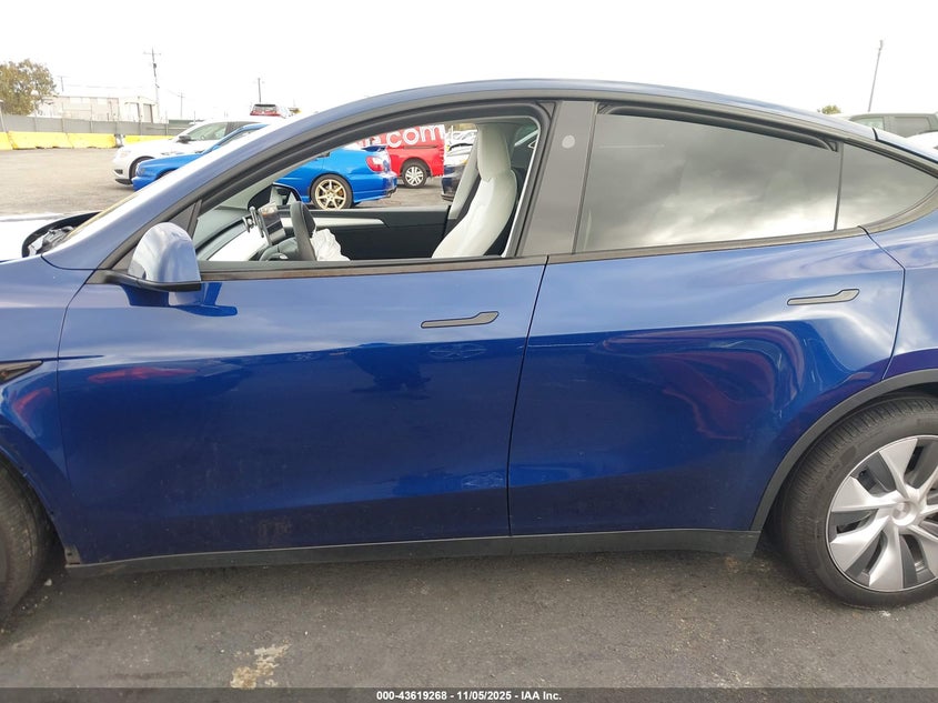 2023 Tesla Model Y Awd/Long Range Dual Motor All-Wheel Drive VIN: 7SAYGDEE1PA207518 Lot: 43619268