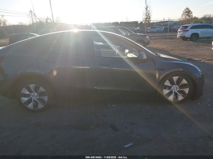 2023 Tesla Model Y Awd/Long Range Dual Motor All-Wheel Drive VIN: 7SAYGDEE0PF615379 Lot: 43619402