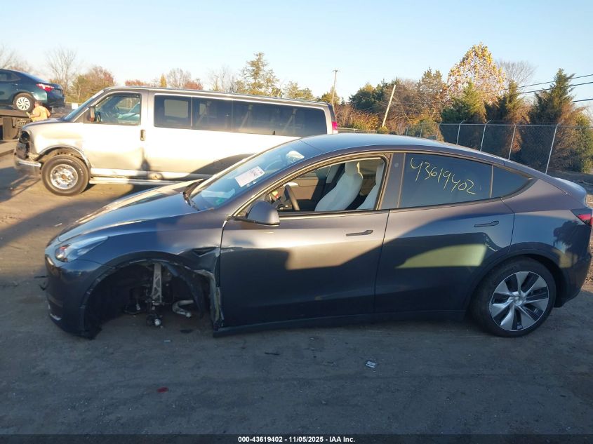 2023 Tesla Model Y Awd/Long Range Dual Motor All-Wheel Drive VIN: 7SAYGDEE0PF615379 Lot: 43619402