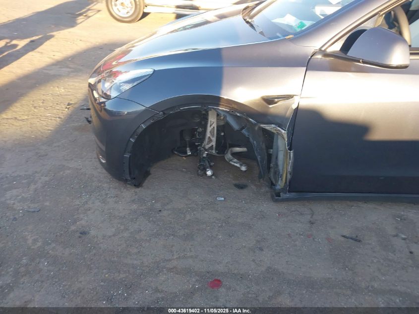 2023 Tesla Model Y Awd/Long Range Dual Motor All-Wheel Drive VIN: 7SAYGDEE0PF615379 Lot: 43619402