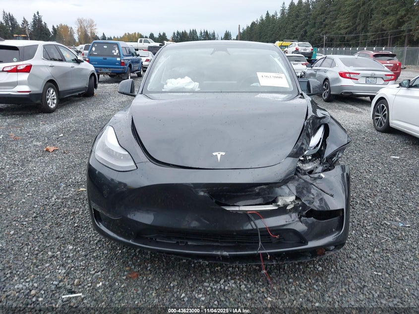 2025 Tesla Model Y Long Range Dual Motor Rear-Wheel Drive VIN: 7SAYGDED5SF258801 Lot: 43623000