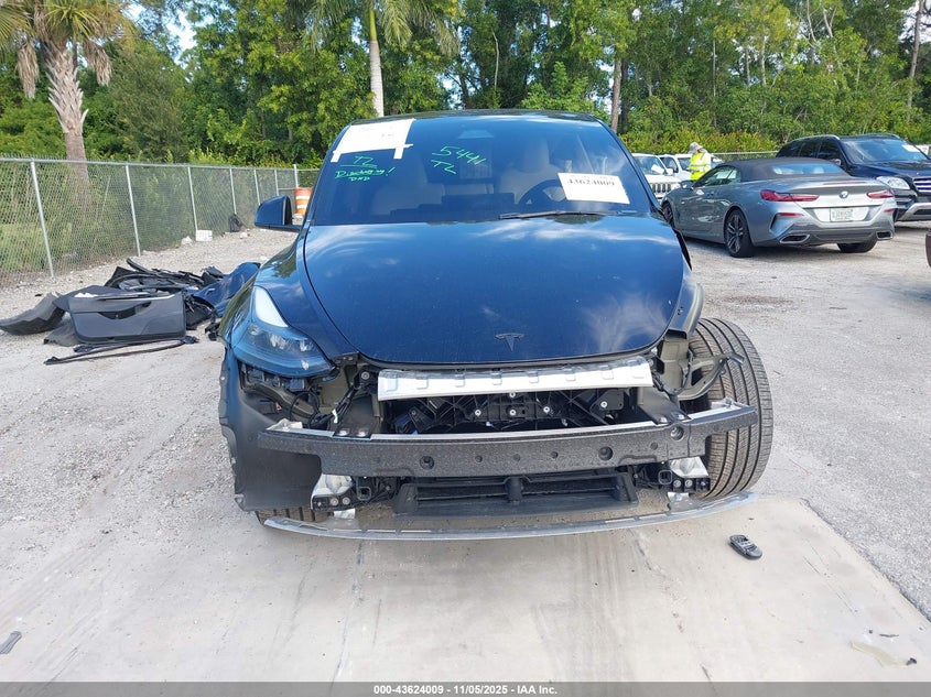 2024 Tesla Model Y Long Range Dual Motor All-Wheel Drive VIN: 7SAYGDEE7RA321381 Lot: 43624009