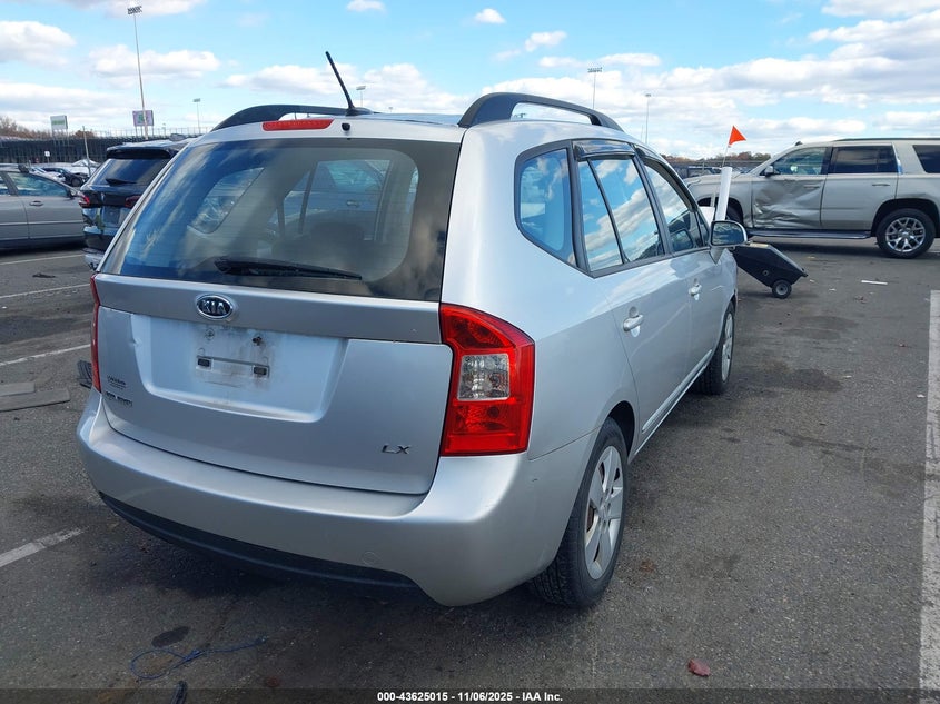 KNAFG528097250569 2009 KIA RONDO photo no. 4