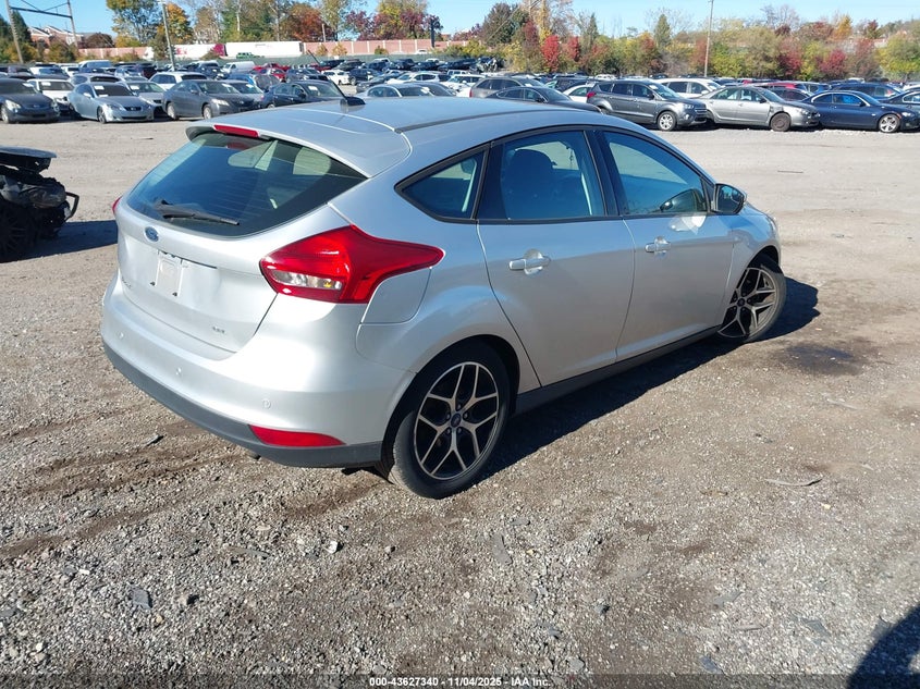 2017 FORD FOCUS SEL - 1FADP3M24HL297591
