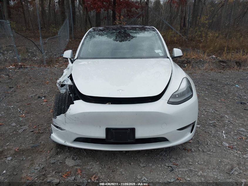 2023 Tesla Model Y Awd/Long Range Dual Motor All-Wheel Drive VIN: 7SAYGAEE0PF785563 Lot: 43629211