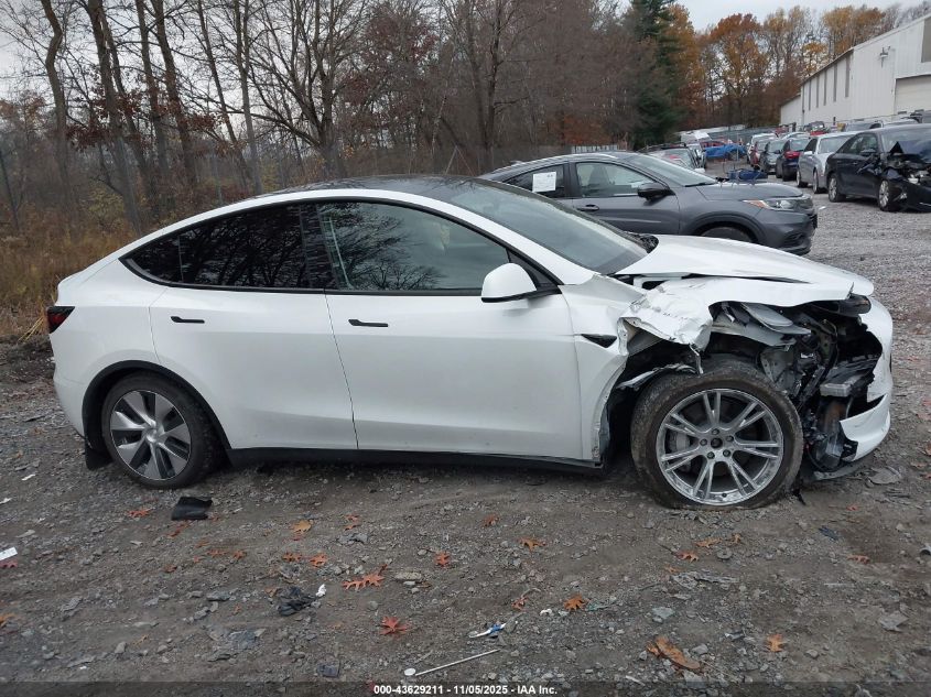 2023 Tesla Model Y Awd/Long Range Dual Motor All-Wheel Drive VIN: 7SAYGAEE0PF785563 Lot: 43629211