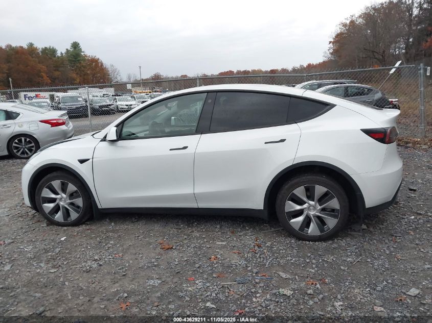 2023 Tesla Model Y Awd/Long Range Dual Motor All-Wheel Drive VIN: 7SAYGAEE0PF785563 Lot: 43629211