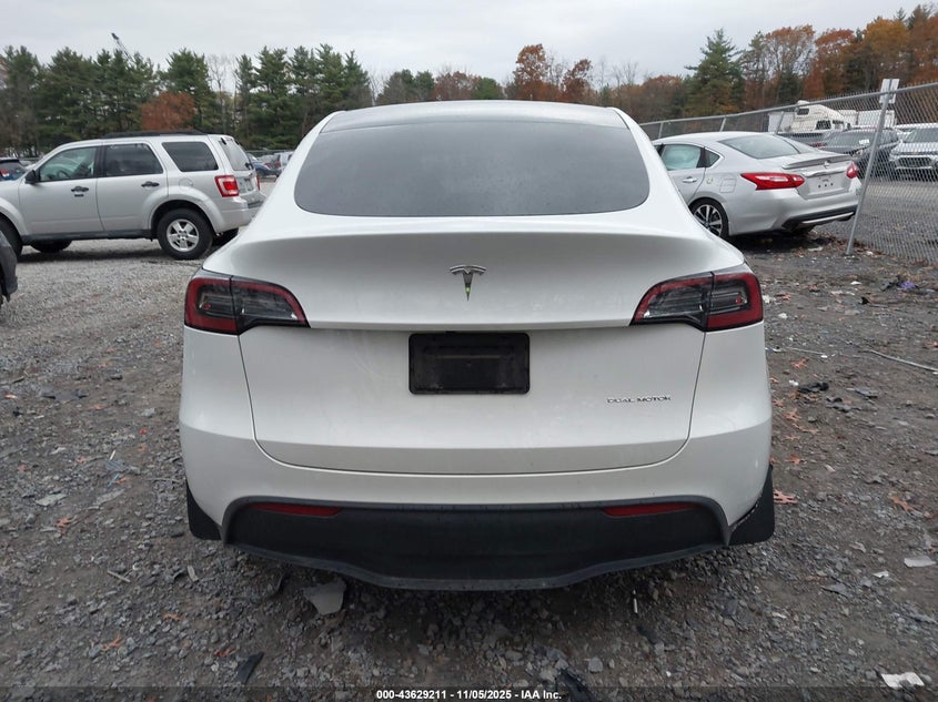 2023 Tesla Model Y Awd/Long Range Dual Motor All-Wheel Drive VIN: 7SAYGAEE0PF785563 Lot: 43629211