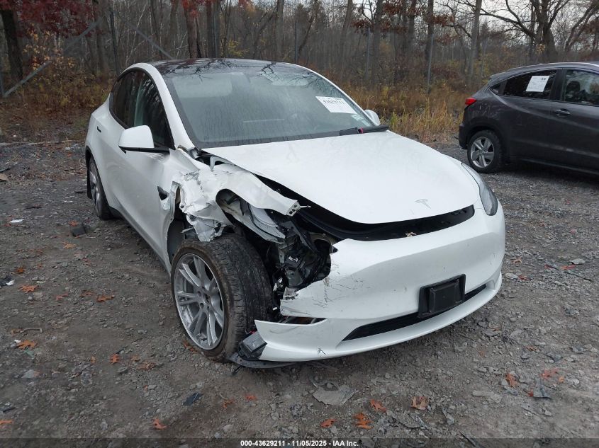 2023 Tesla Model Y Awd/Long Range Dual Motor All-Wheel Drive VIN: 7SAYGAEE0PF785563 Lot: 43629211