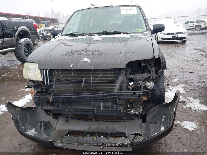 2006 Mercury Mariner Luxury/Premier VIN: 4M2CU57136DJ07228 Lot: 43630061