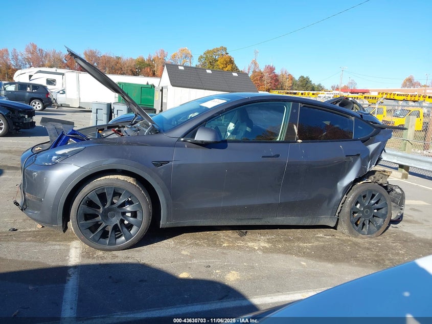 2023 Tesla Model Y Awd/Long Range Dual Motor All-Wheel Drive VIN: 7SAYGAEE0PF710166 Lot: 43630703