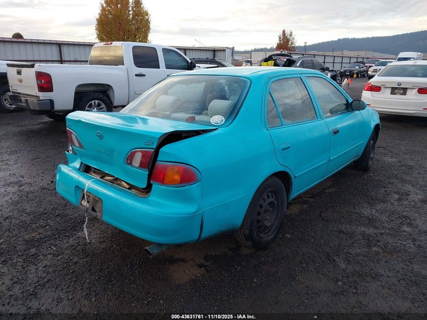 1NXBR12E8YZ413801 2000 TOYOTA COROLLA photo no. 4