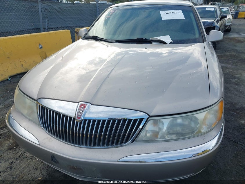 2001 Lincoln Continental VIN: 1LNHM97V31Y736149 Lot: 43634063