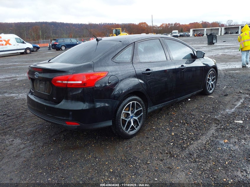 2017 FORD FOCUS SEL 1FADP3H23HL311457