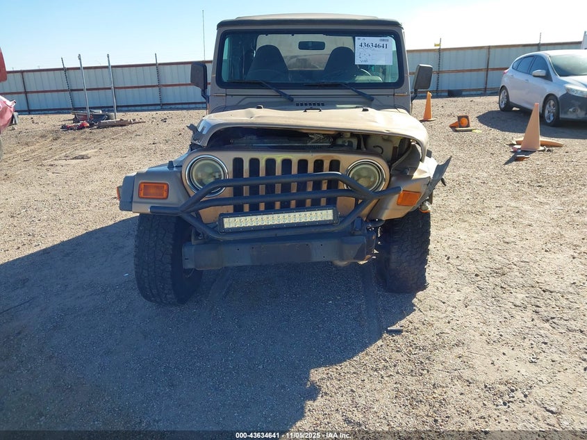 2000 Jeep Wrangler Sport VIN: 1J4FA49S4YP752056 Lot: 43634641