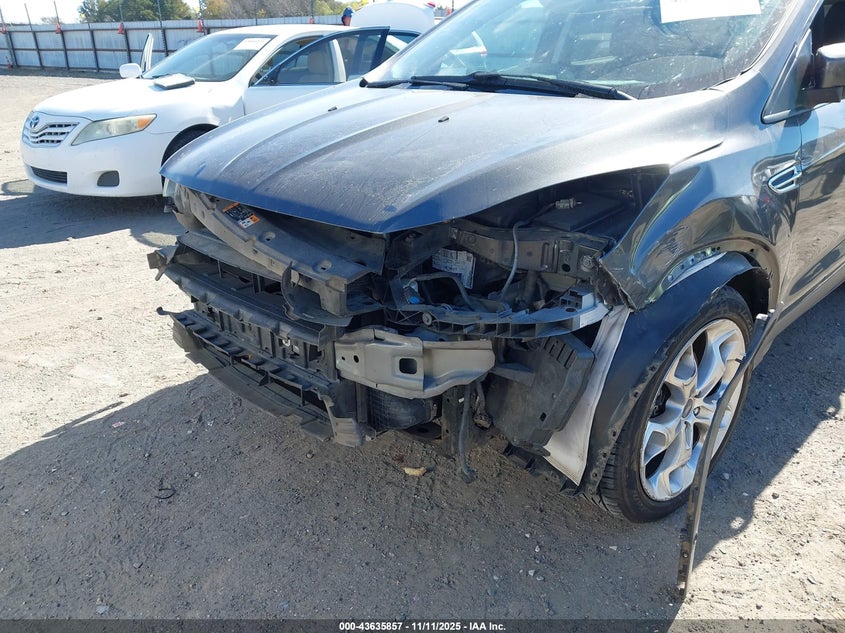 2016 Ford Escape Titanium VIN: 1FMCU0J96GUB70831 Lot: 43635857