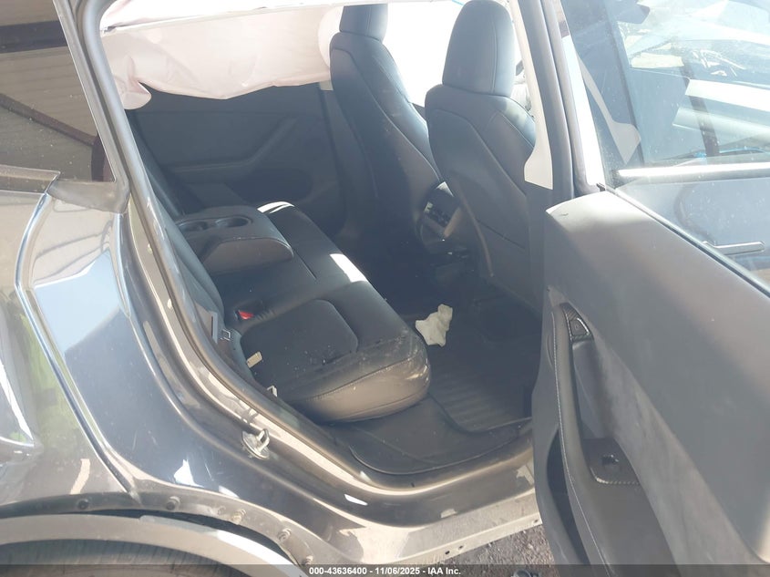 2023 Tesla Model Y Awd/Long Range Dual Motor All-Wheel Drive VIN: 7SAYGDEE2PA208211 Lot: 43636400