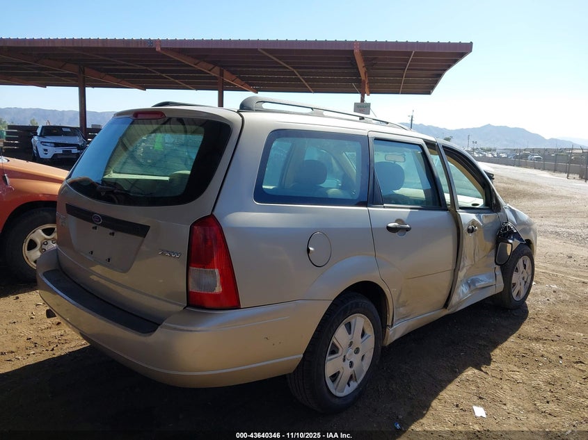 1FAHP36NX6W149918 2006 FORD FOCUS photo no. 4