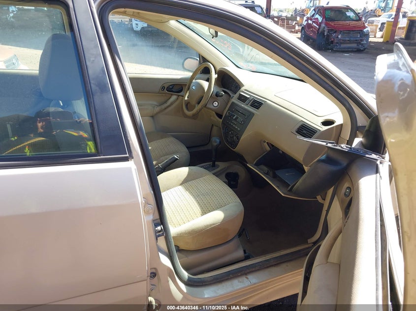 1FAHP36NX6W149918 2006 FORD FOCUS photo no. 5