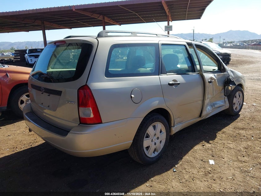 1FAHP36NX6W149918 2006 FORD FOCUS photo no. 6