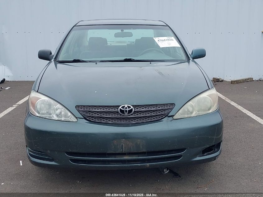2004 Toyota Camry Le VIN: JTDBE32K240267270 Lot: 43641026