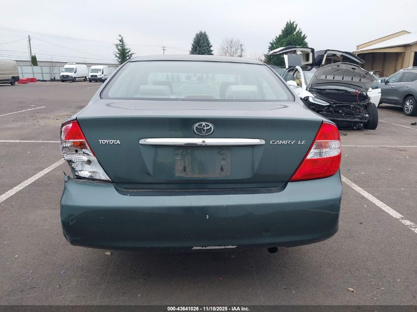 2004 Toyota Camry Le VIN: JTDBE32K240267270 Lot: 43641026