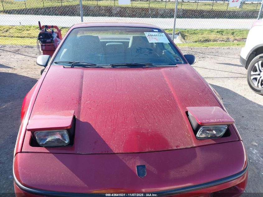 1987 Pontiac Fiero VIN: 1G2PE11R1HP216045 Lot: 43641531