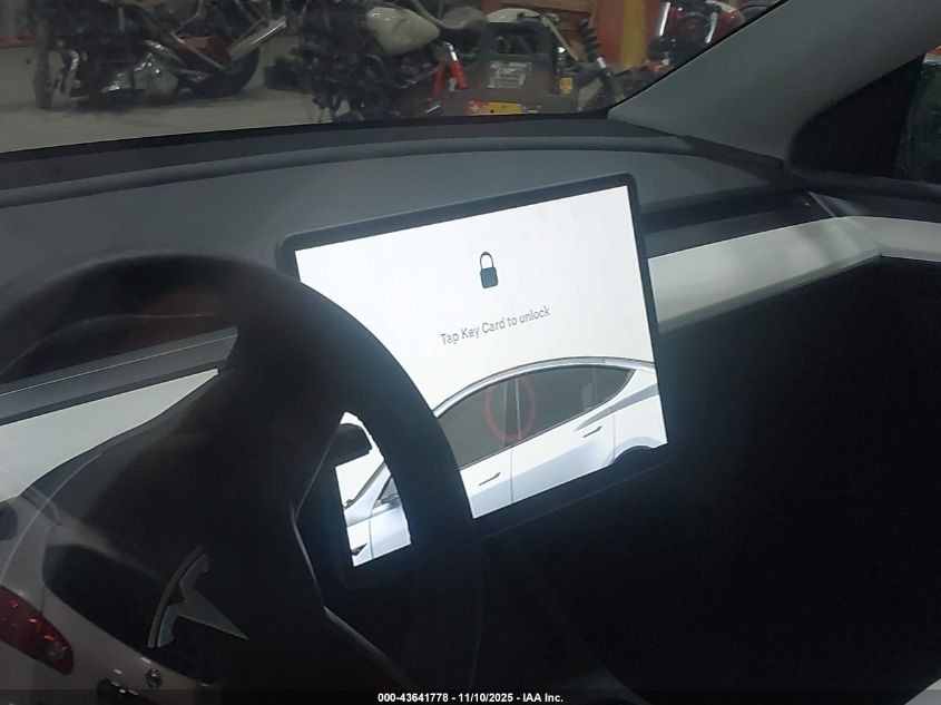 2025 Tesla Model Y Long Range Dual Motor All-Wheel Drive VIN: 7SAYGAEE6SF265117 Lot: 43641778