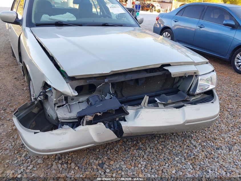 2004 Mercury Grand Marquis Gs VIN: 2MEFM74W24X694928 Lot: 43644133