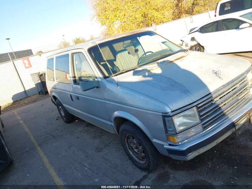 2P4FH41K6JR619098 1988 Plymouth Voyager Se auction photo 1
