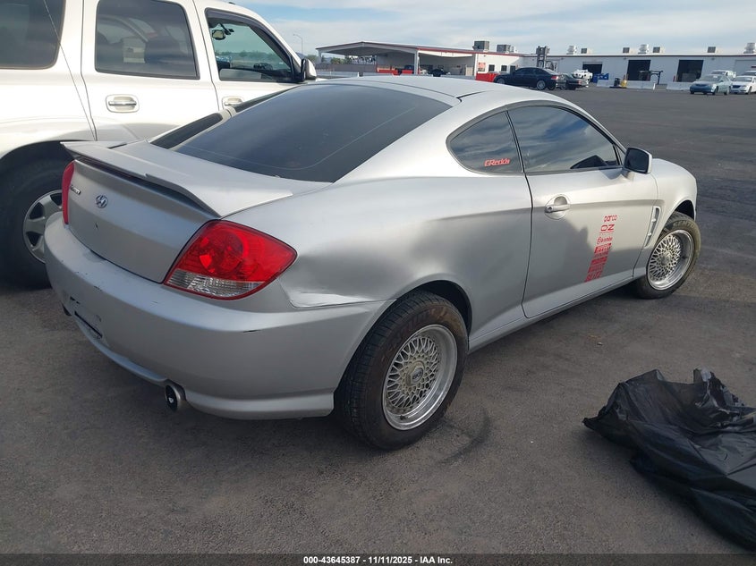 2006 Hyundai Tiburon Gs VIN: KMHHM65D56U194060 Lot: 43645387