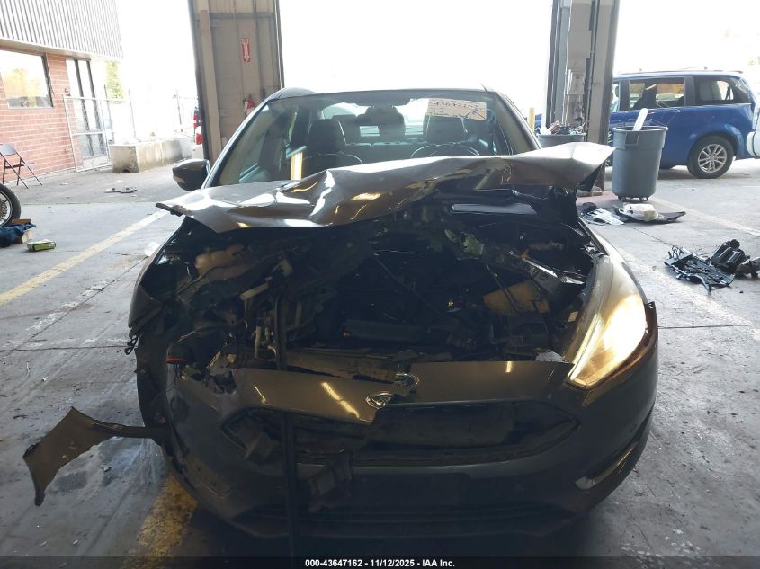 2015 Ford Focus Titanium VIN: 1FADP3J28FL294811 Lot: 43647162