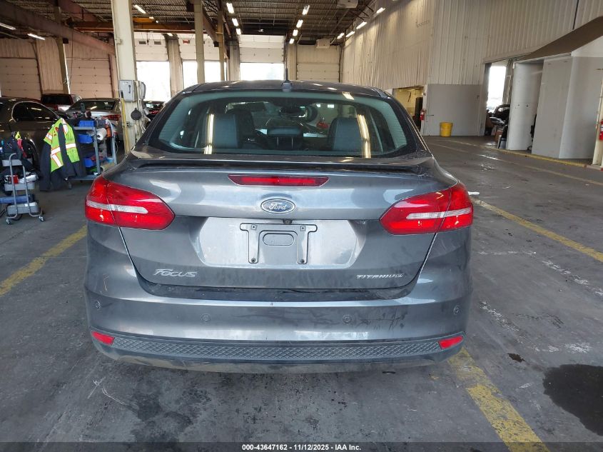 2015 Ford Focus Titanium VIN: 1FADP3J28FL294811 Lot: 43647162